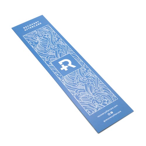 Front of piercing aftercare paper insert on white background, thumbnail sizePaper Insert