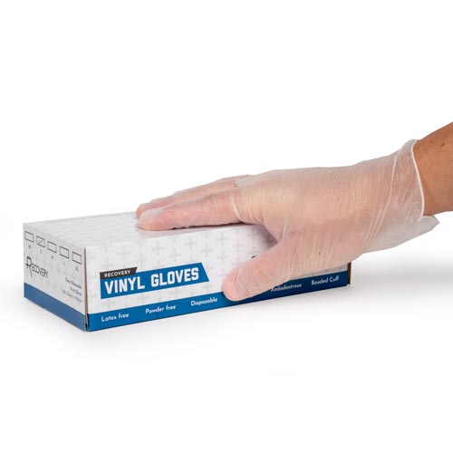 Vinyl Disposable Gloves with gloved hand holding box