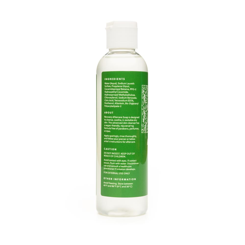 Aftercare soap standing upright and showing ingredients part of the label